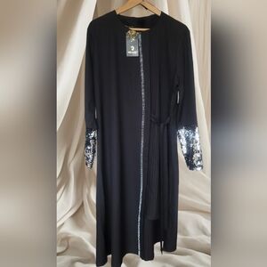 Black Dress with sparkly black and silver sequins sleeve trim.